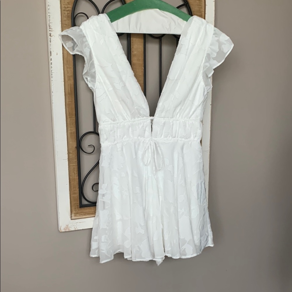 Elegant White V-Neck Romper